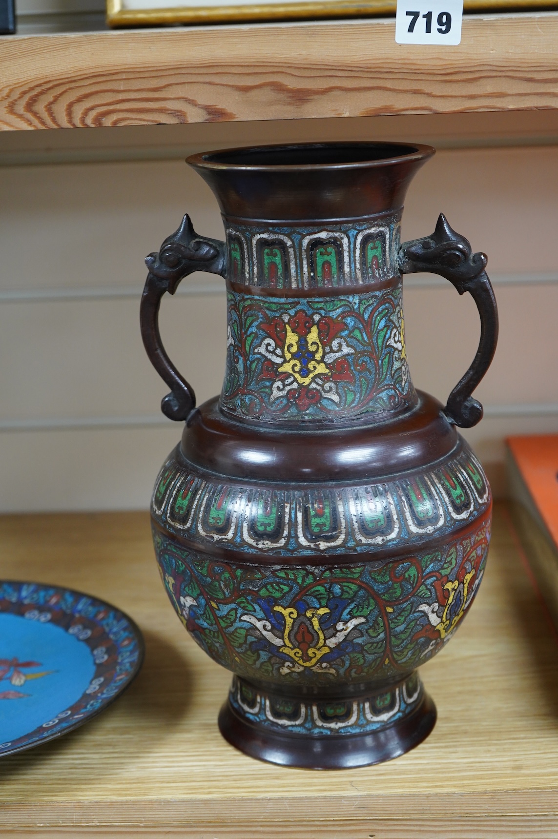 A Japanese archaistic bronze and champlevé enamel cloisonné two handled vase together with a Japanese cloisonné enamel dish, depicting a bird amongst flowers, 30cm high